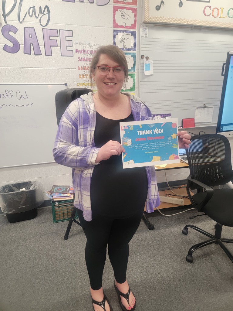 Mrs. Stevenson holding certificate