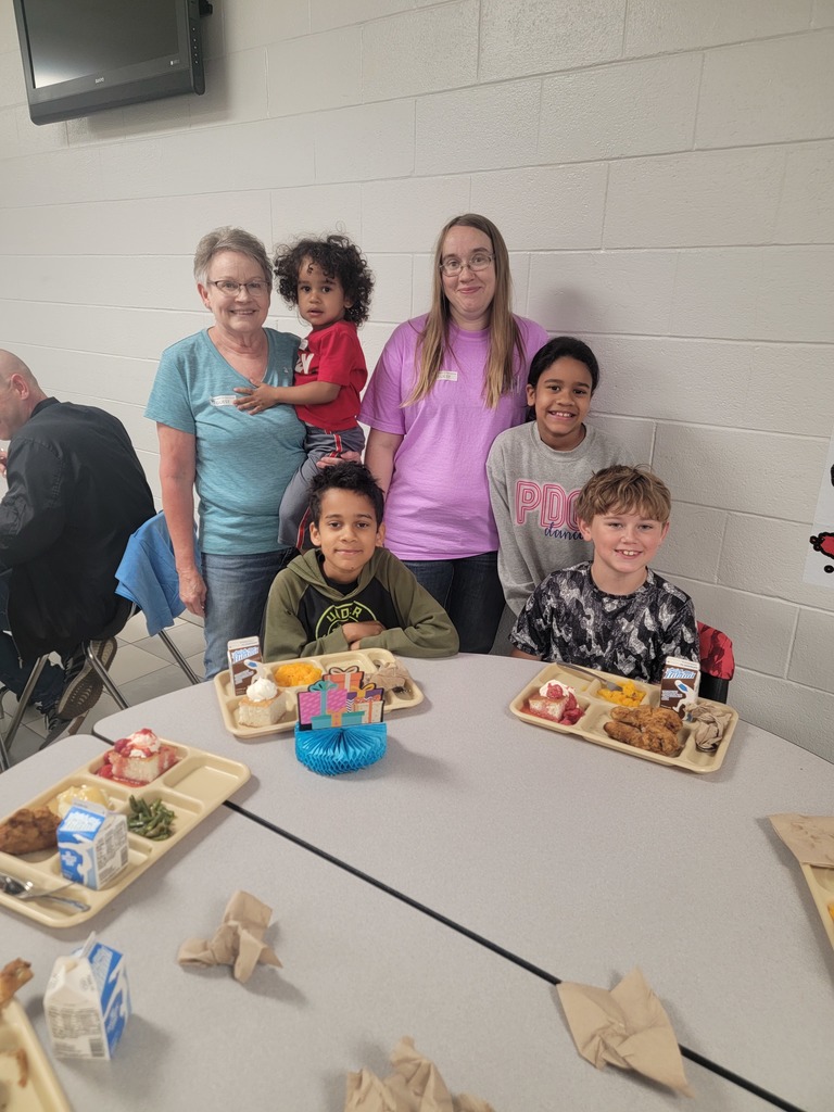 May birthday students eating lunch with family.