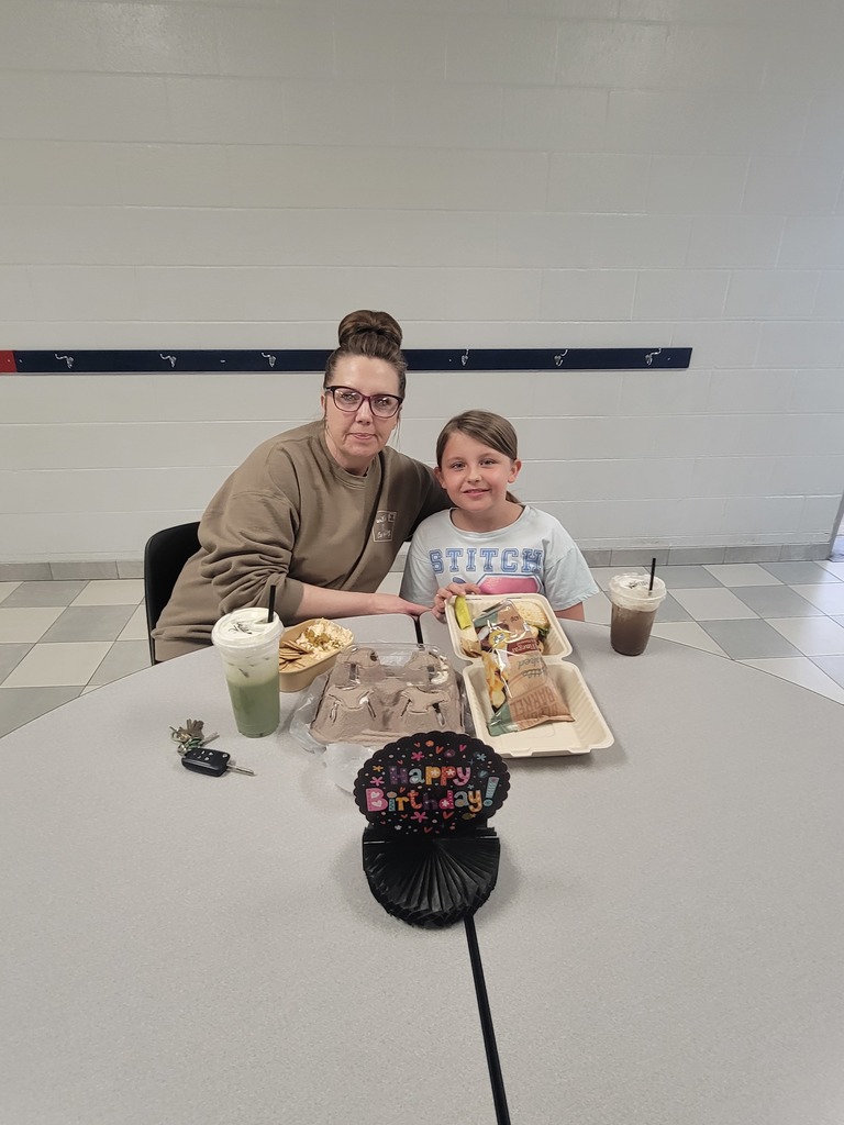 May birthday students eating lunch with family.