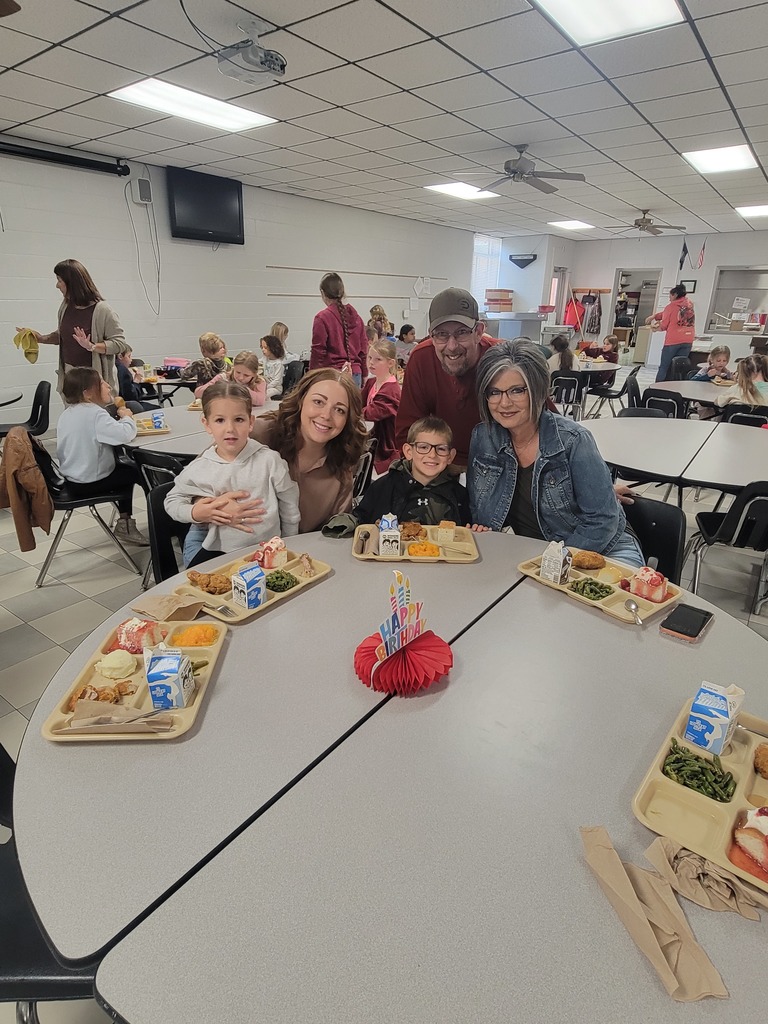 May birthday students eating lunch with family.