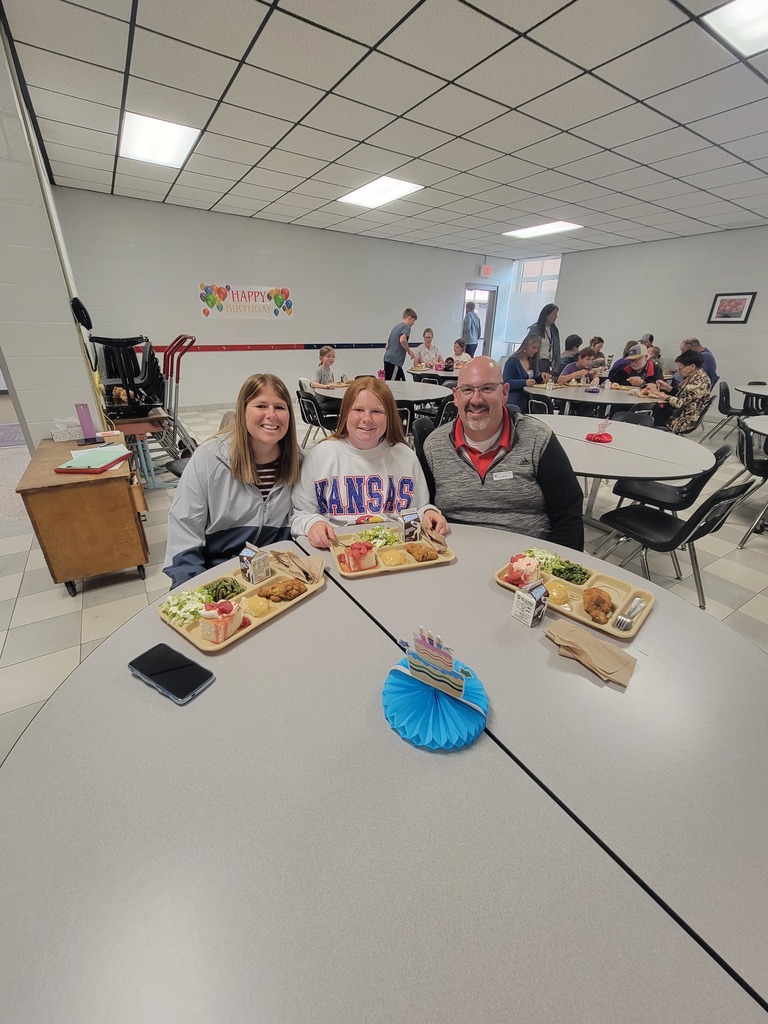 May birthday students eating lunch with family.