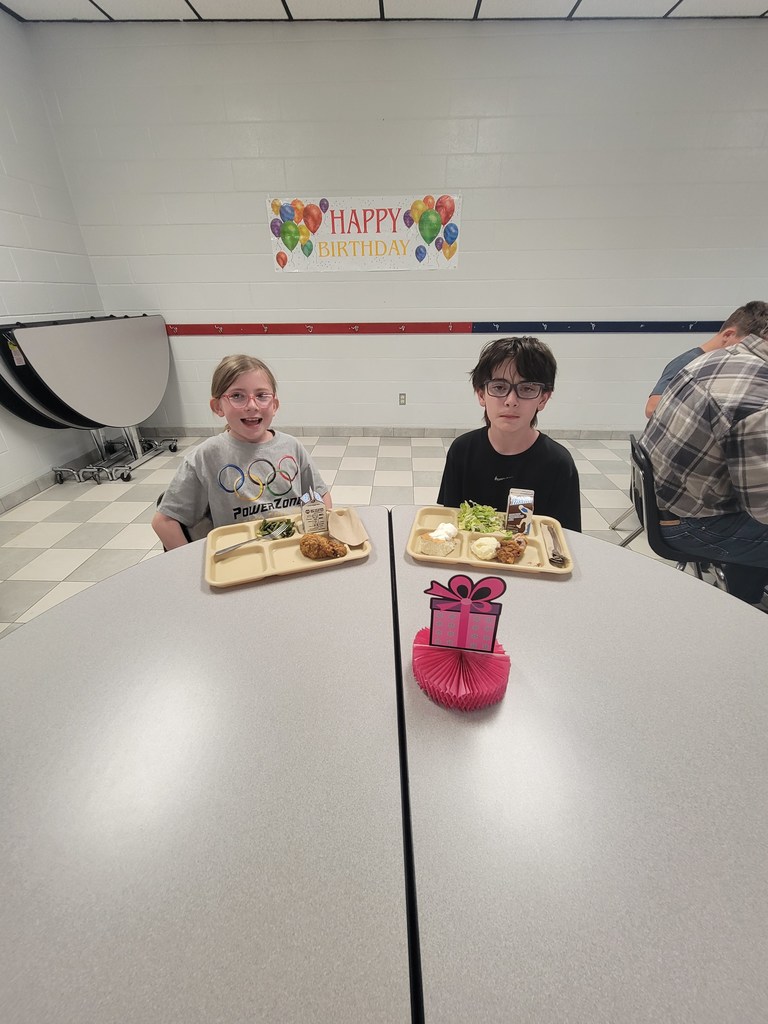 May birthday students eating lunch with family.
