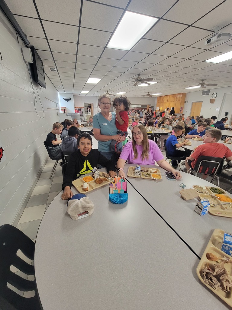 May birthday students eating lunch with family.