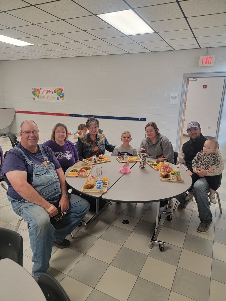 May birthday students eating lunch with family.