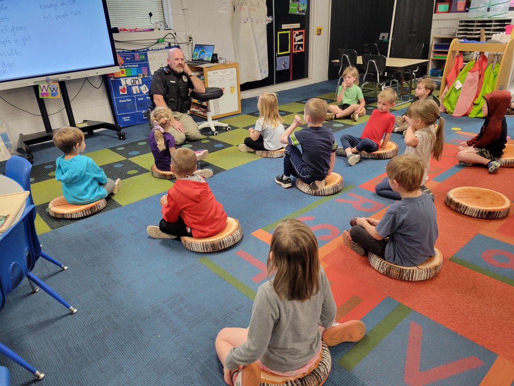 morning class listening to sheriff at circle time