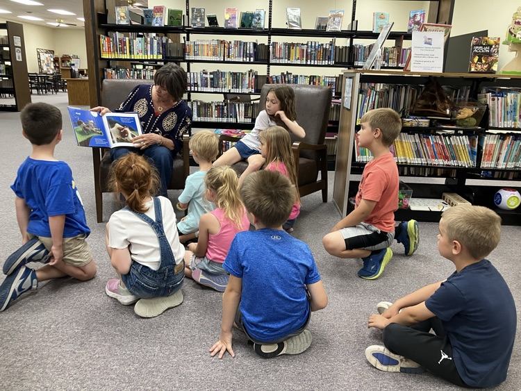 Mrs. Peters class listening to a story at the City Library