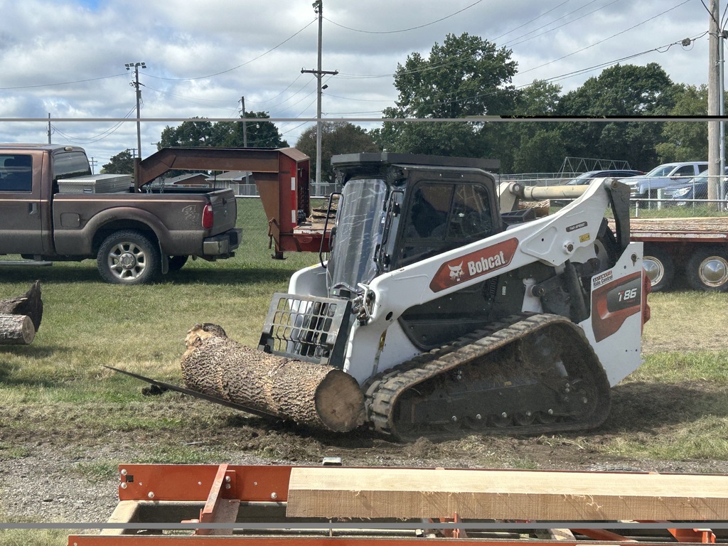 Loading a Log onto the mill.