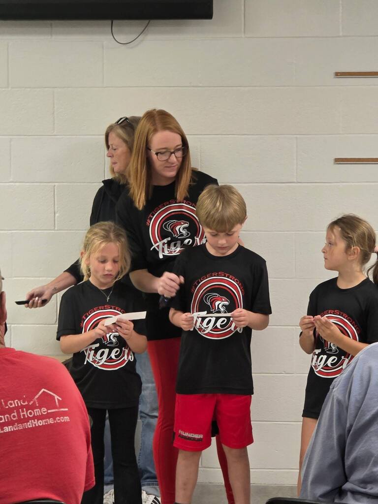 students performing for grandparents