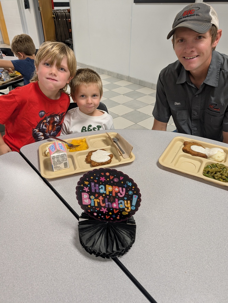 student with October birthday and family/friends eating lunch