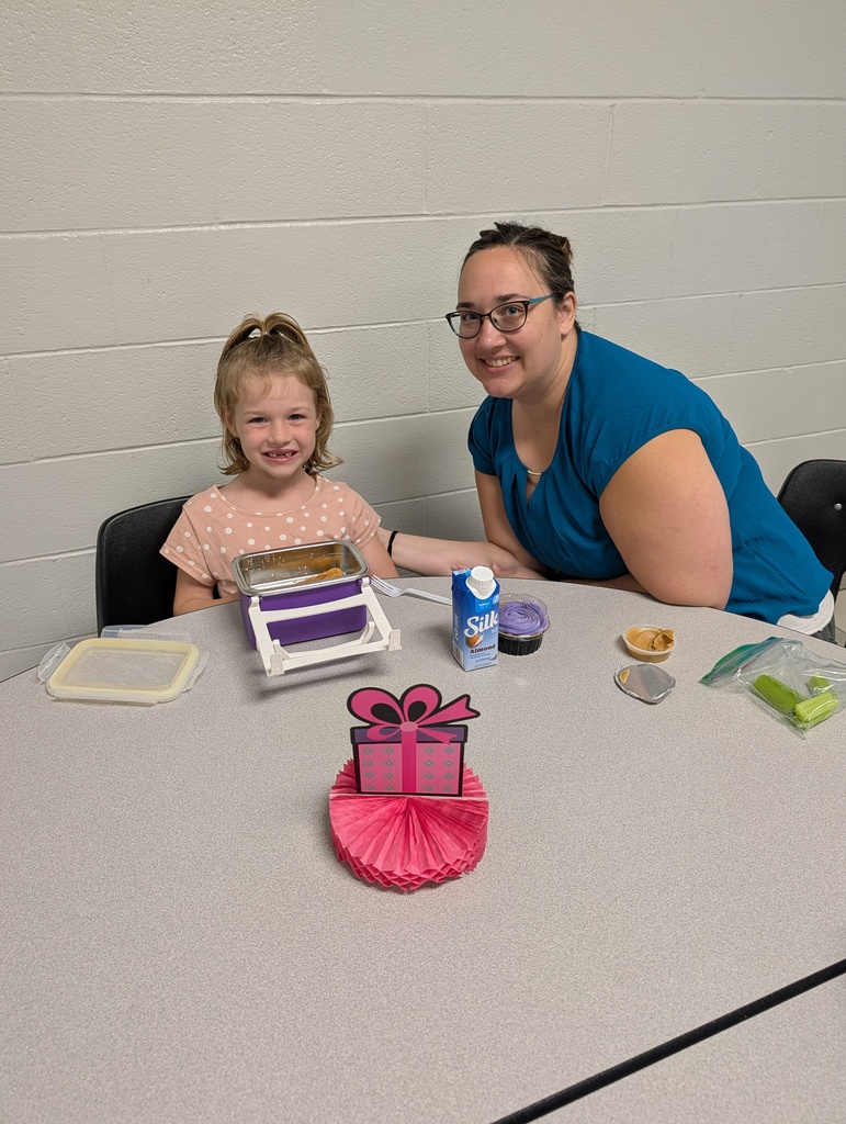 student with October birthday and family/friends eating lunch