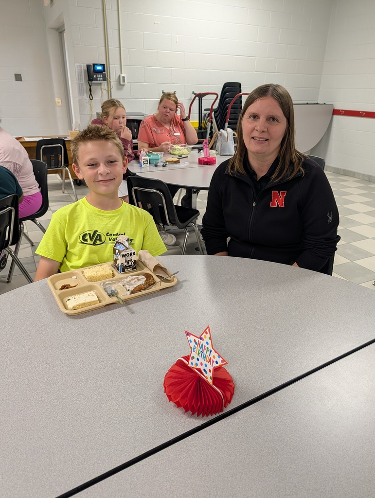 student with October birthday and family/friends eating lunch