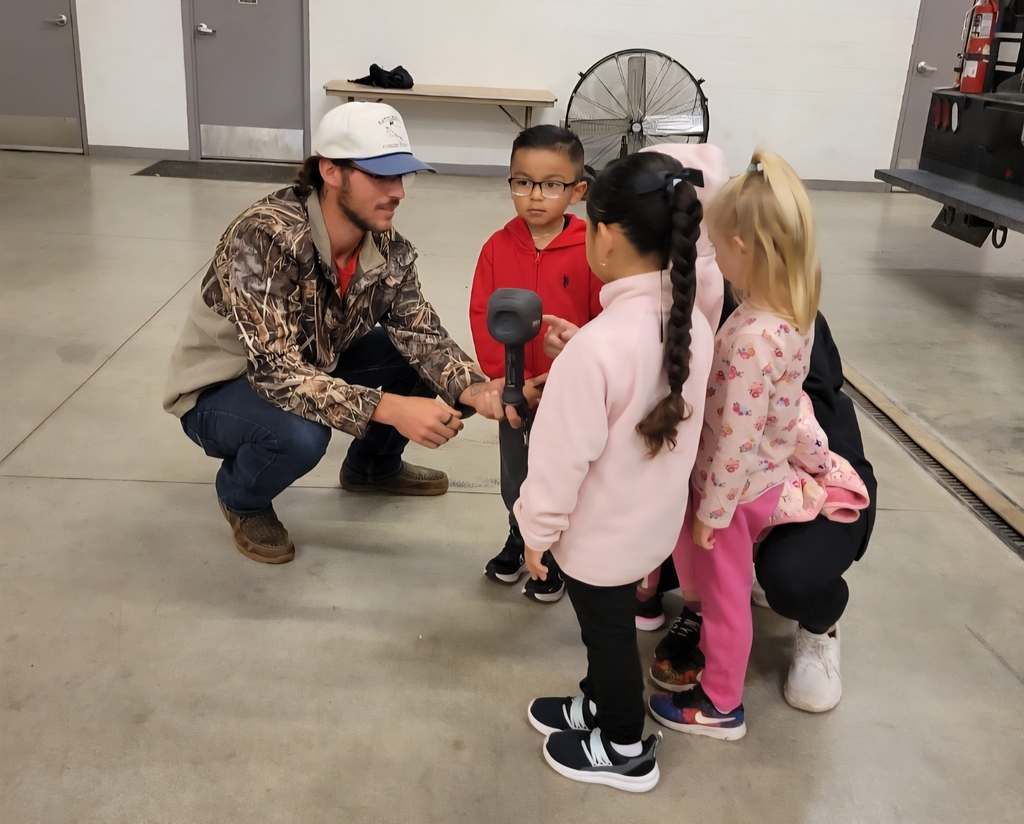 Josiah showing morning kids camera
