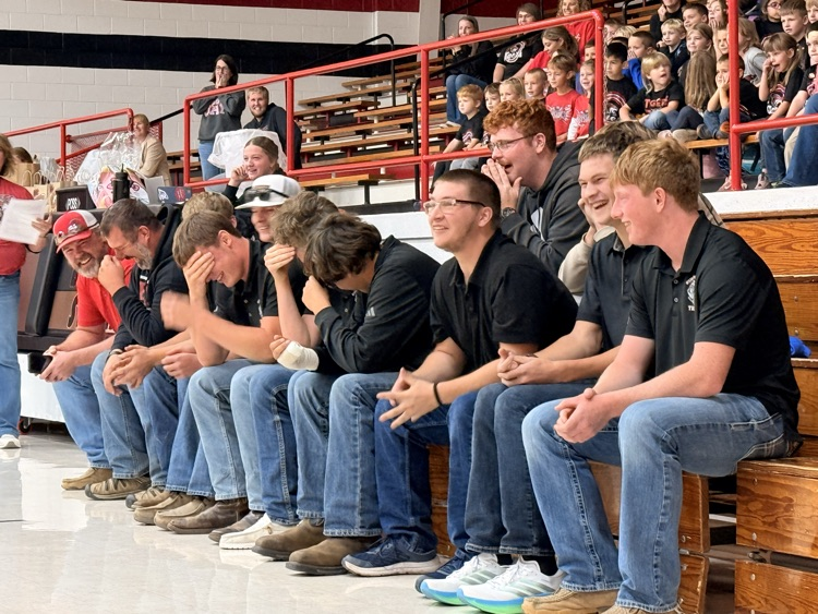 Senior football boys very embarrassed by their dancing mothers