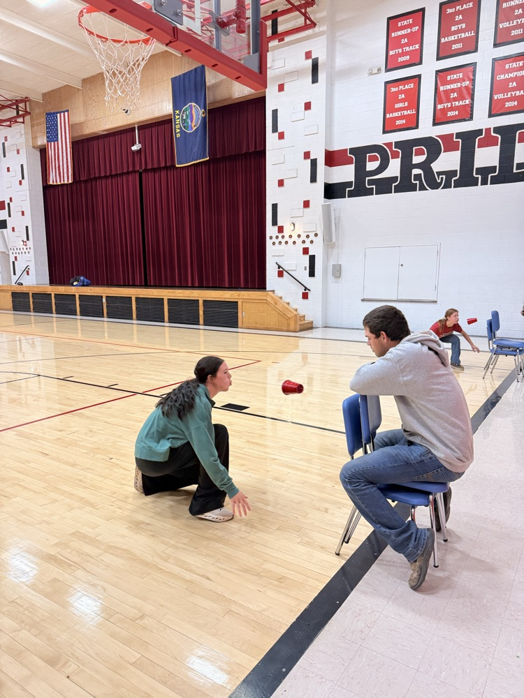 a tight race between volleyball player Anna Goeckel and Cross Country runner Madison Thompson