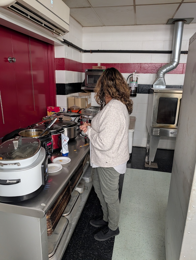 teacher getting food for conferences