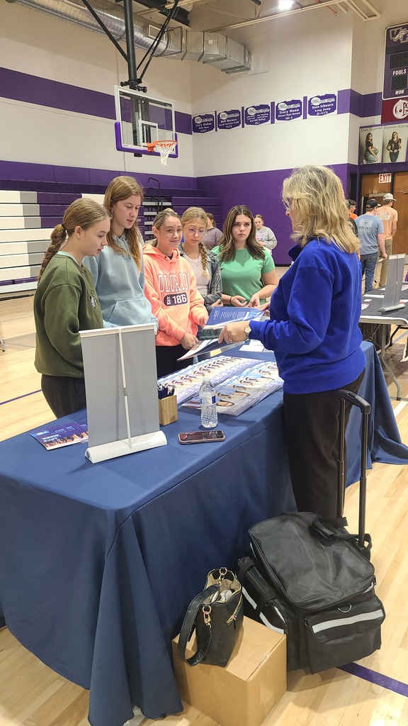 Students engaging with representatives.
