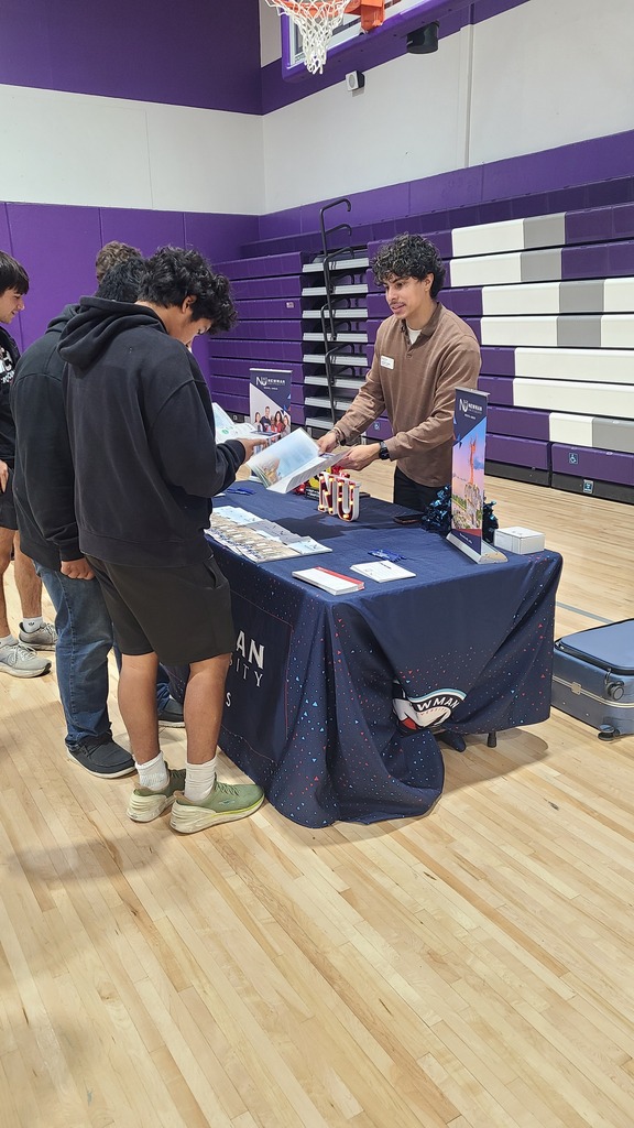 Students engaging with representatives.