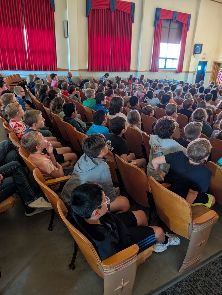 students watching the play