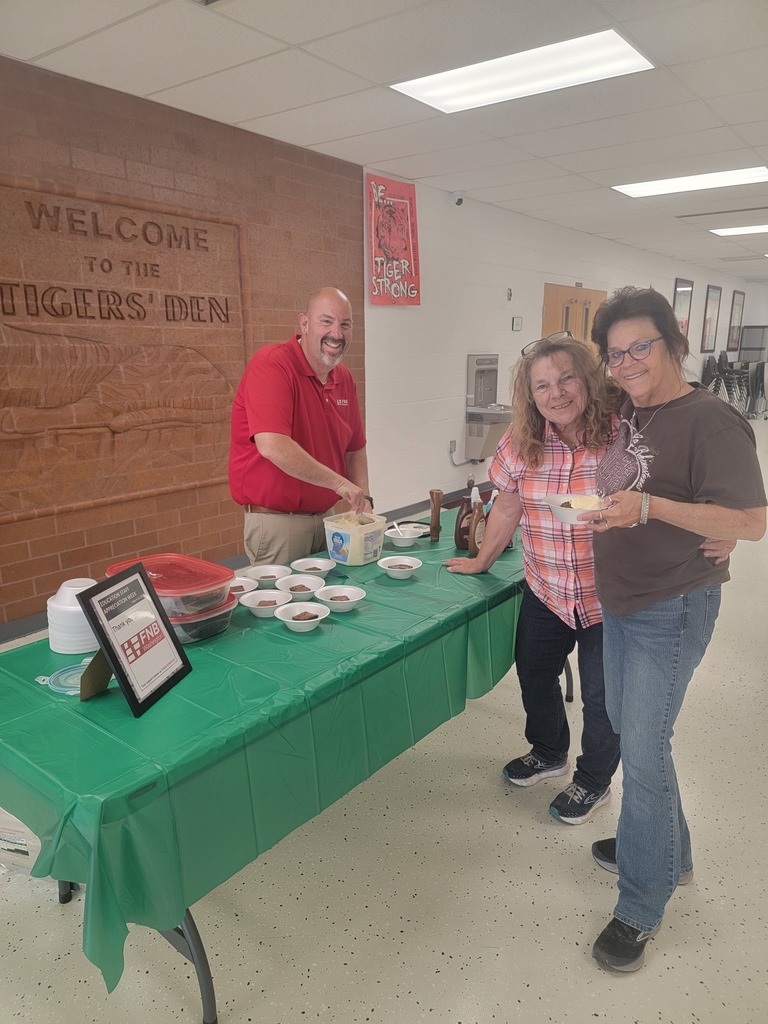 Ryan serving the bus drivers brownie sundaes.