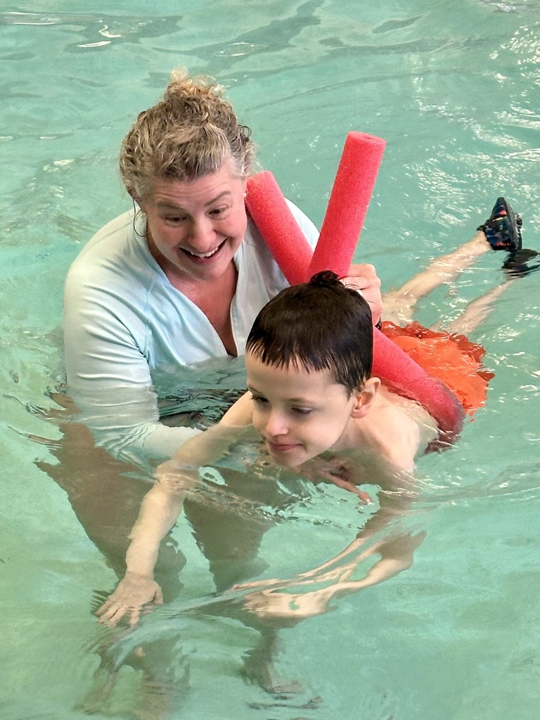 Ms Lemon swimming with Jeffrey