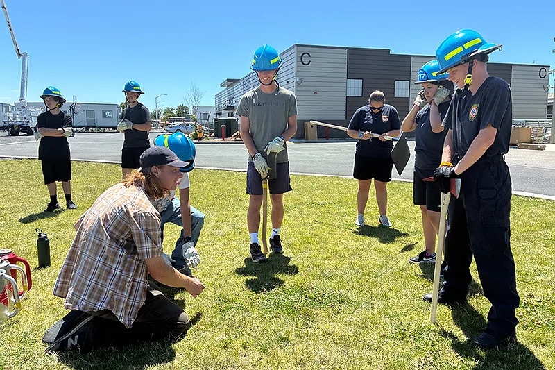 Students participating in the firefighting program of Tri-Tech Skills Center’s Summer Academy practice using various pieces of equipment. More young people are considering trades for their future careers as they weigh the cost of college and the stability of jobs that could be impacted by artificial intelligence. 