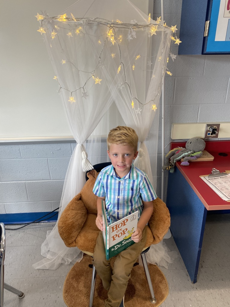Enjoying a book in a comfy chair! 