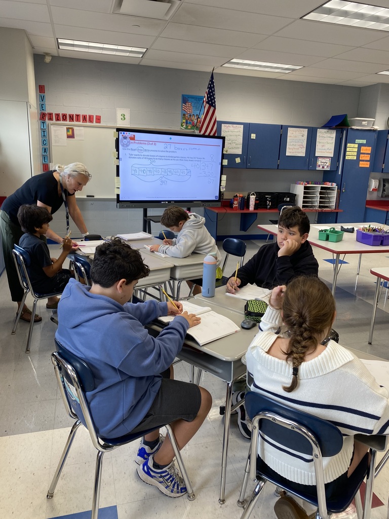 Fifth graders worked on division in math.  