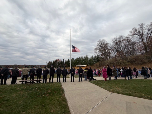 Veterans assembled for the flag raising ceremony.