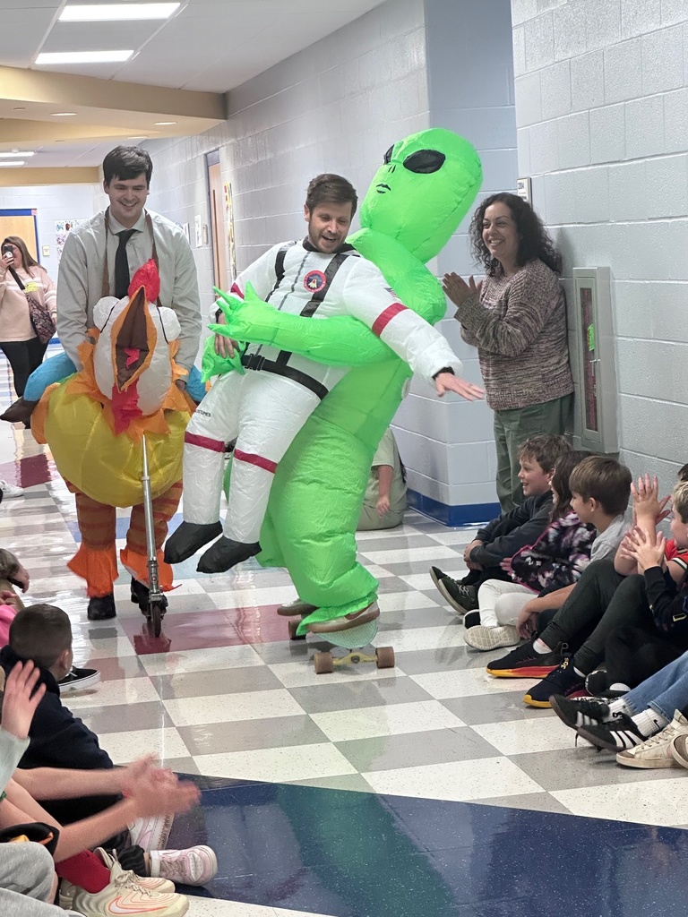 Racing down the hallway.