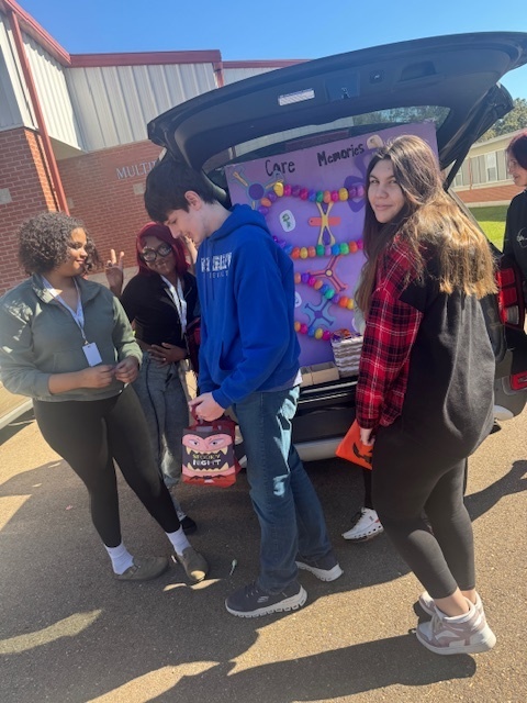 Student Council, Mrs. Watts’ Early Childhood Education Classes, and WVHS faculty/staff surprised Mrs. Porter’s and Mrs. Camp’s  students with a trunk or treat. Both the student council and Early Childhood Class did an awesome job!! Thank you WVHS for the candy donations and putting a big smile on their faces.