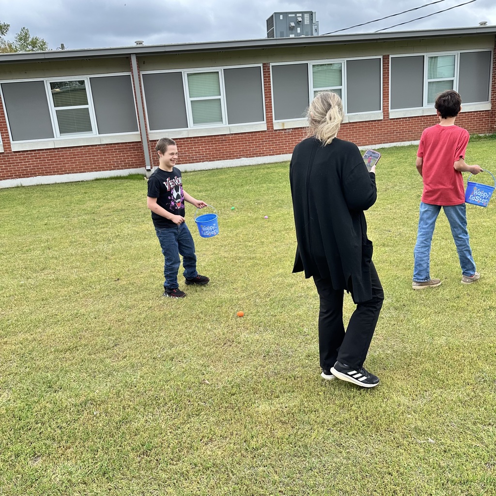 students hunting eggs