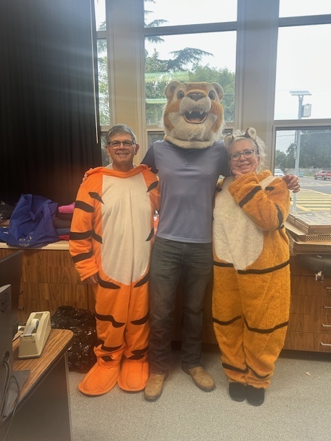 Coach Miller, Coach Kerr, and Ms. Hall