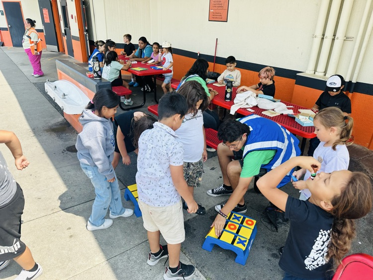 Here are our students playing Tic-Tac-Toe with our P.A.L. 