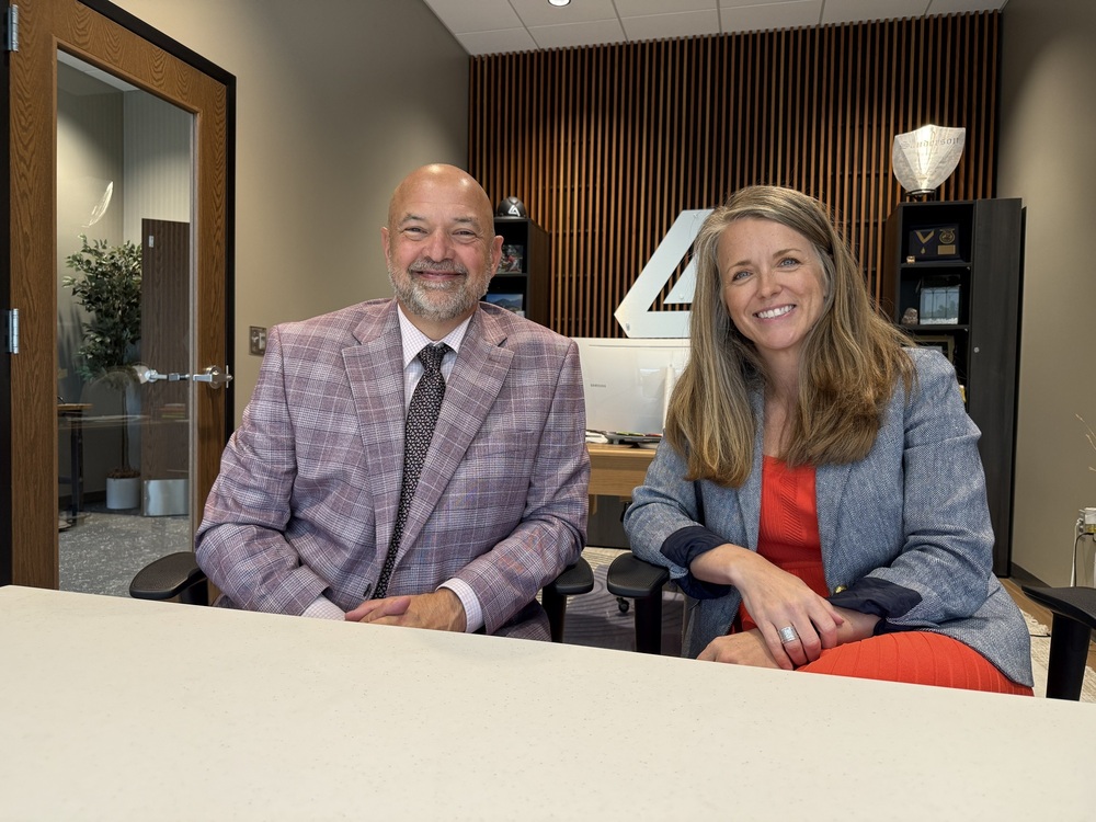 Dr. Jeff Danielsen and Tiffany Sanderson smiling.