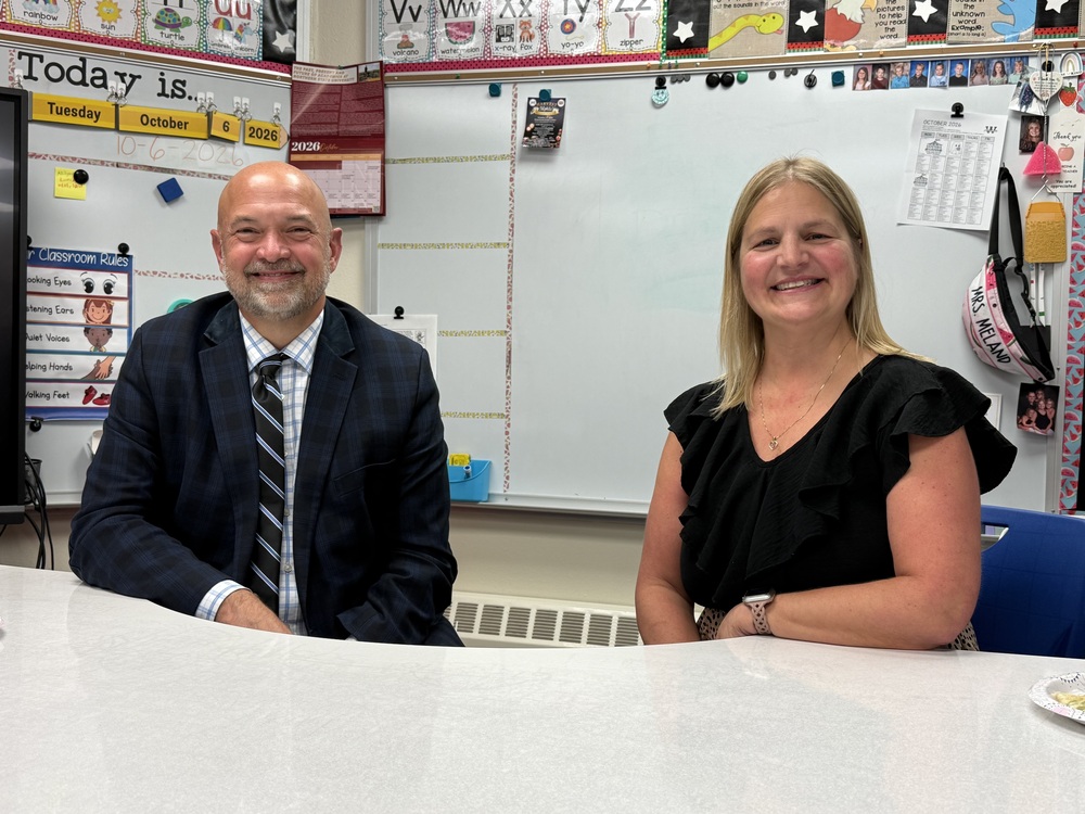 Dr. Danielsen and Renee Meland smiling at the camera.