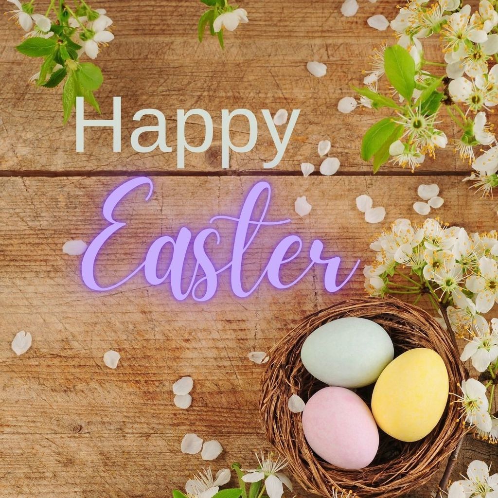 a wood plank background with white flowers in the corners and petals all around, a nest with pink, blue and yellow eggs and the words "Happy Easter"
