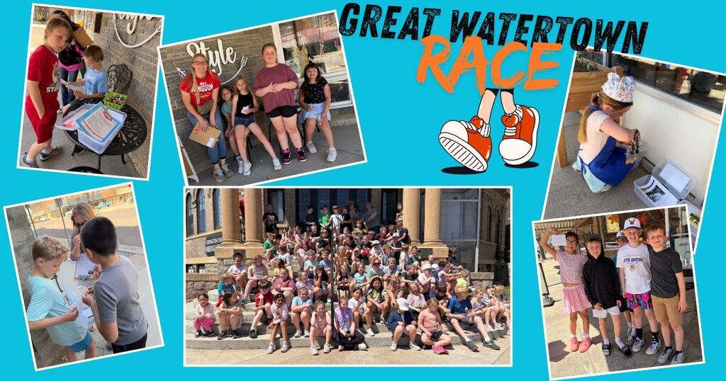 Grade 3 students working in groups during the Great Watertown Race field trip in downtown Watertown while using maps and completing local history challenges.
