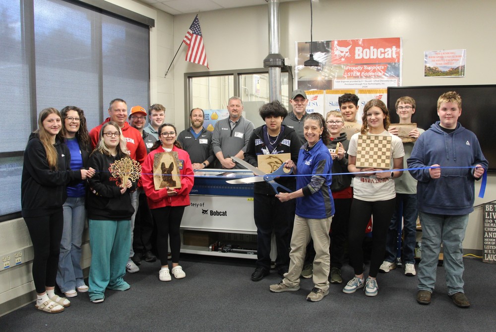 Doosman Bobcat awards grant for laser engraving machine at Riverside Middle School