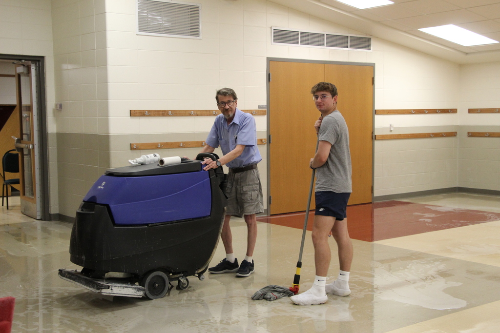 Staff deep cleaning classroom