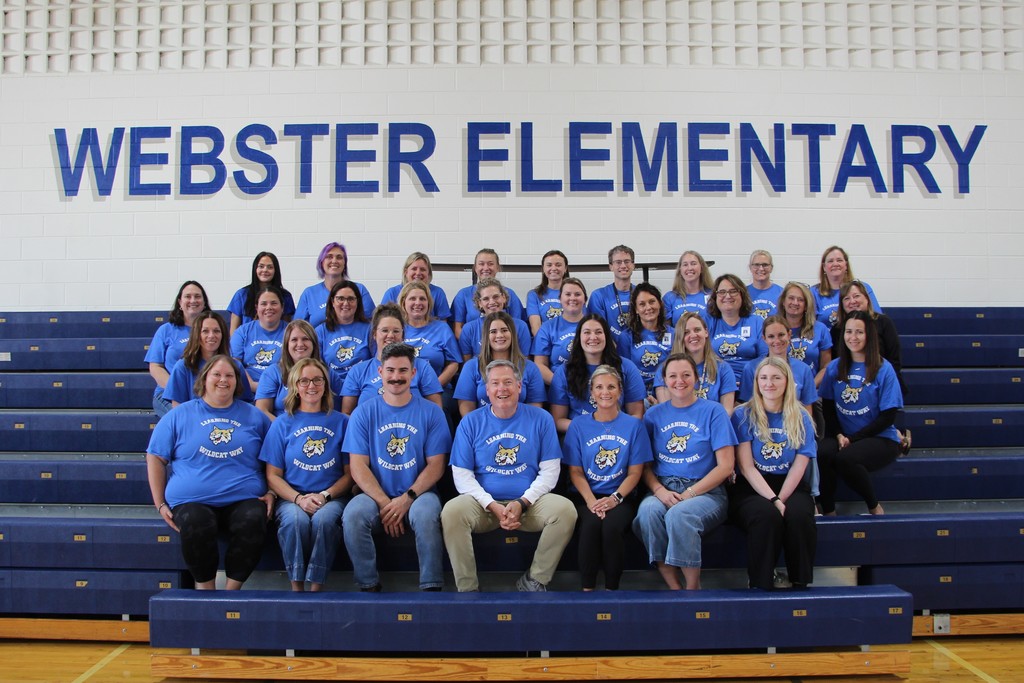 Webster Students and Staff wearing 100% every day shirts