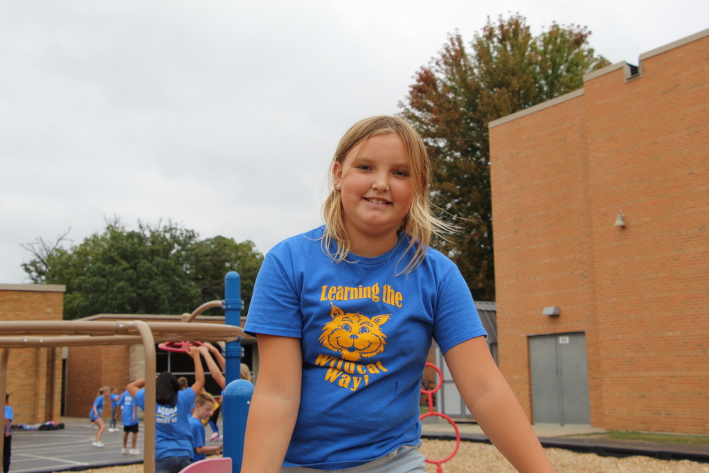Webster Students and Staff wearing 100% every day shirts