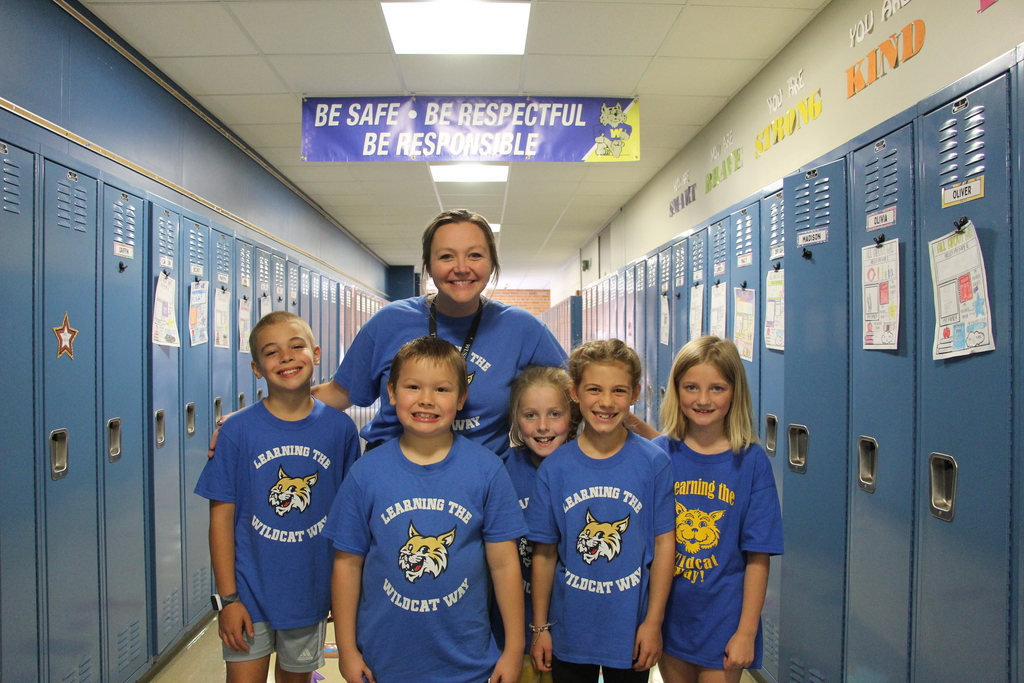Webster Students and Staff wearing 100% every day shirts