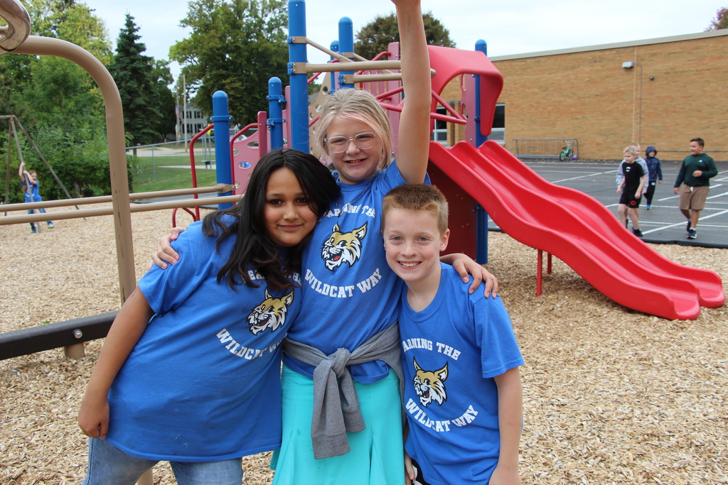 Webster Students and Staff wearing 100% every day shirts