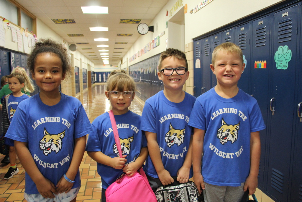 Webster Students and Staff wearing 100% every day shirts