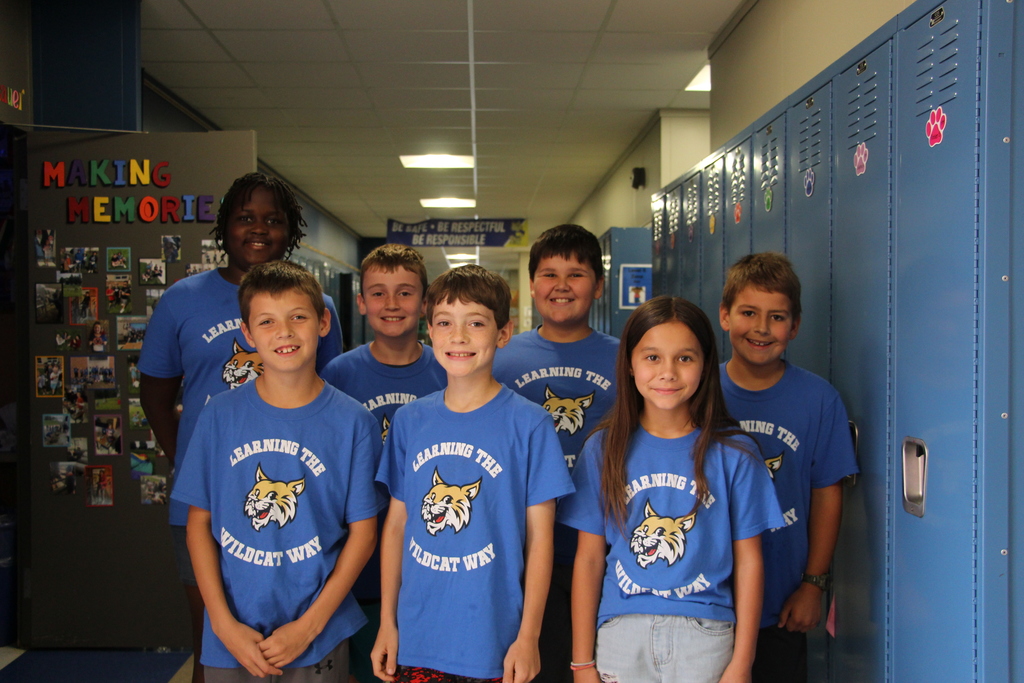 Webster Students and Staff wearing 100% every day shirts