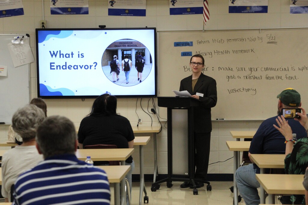 Endeavor Charter School hosts Gallery Night. Pictured is a student presenting their year-end project.