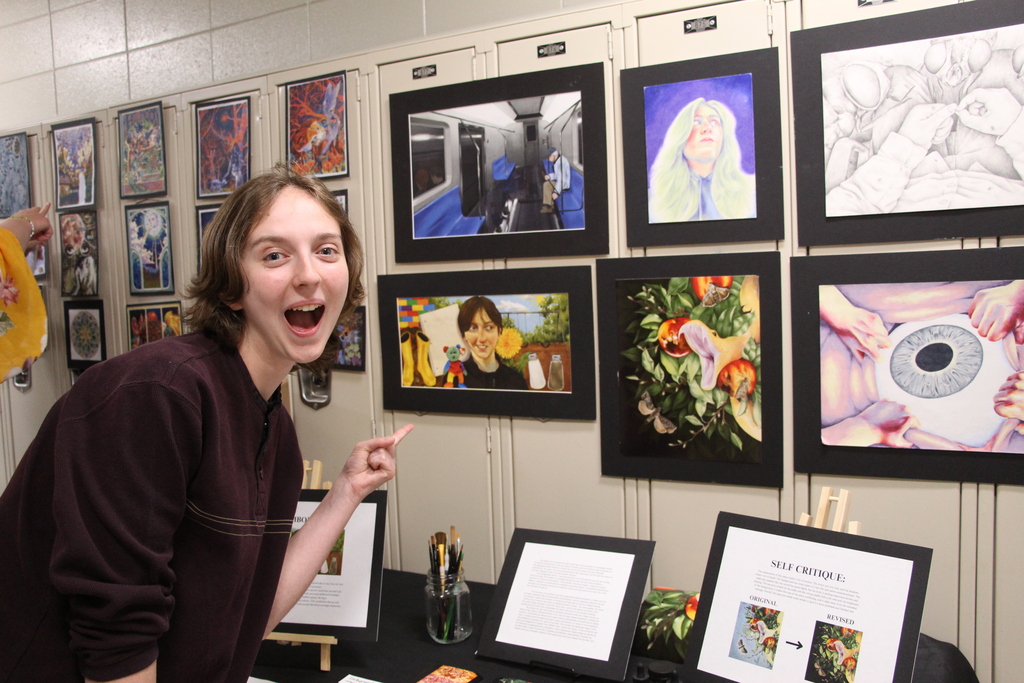 Endeavor Charter School hosts Gallery Night. Pictured is a student presenting their year-end project.