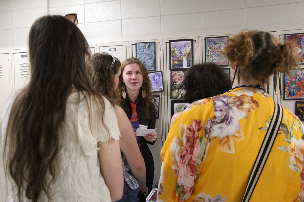 Endeavor Charter School hosts Gallery Night. Pictured is a student presenting their year-end project.