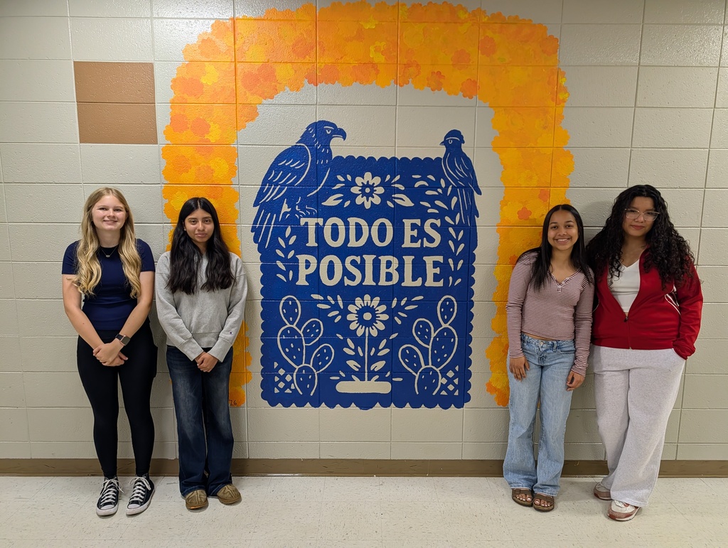 Dual Language students paint mural at WHS