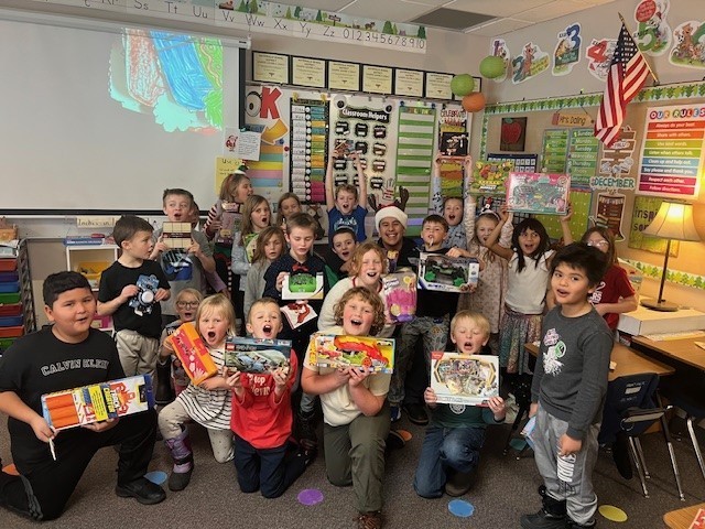 CIS handing out gifts to students.